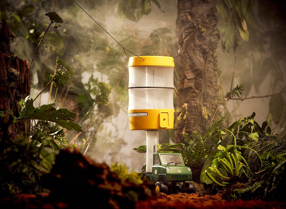 The yellow capsule is a small living space that can be pulled into the trees.